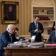 President Donald Trump speaks on the phone with Russian President Vladimir Putin in the Oval Office of the White House in Washington, D.C., on Jan. 28, 2017. Also pictured: Then-White House chief of staff Reince Priebus, Vice President Mike Pence (seated), White House chief strategist Steve Bannon and then-press secretary Sean Spicer. (Drew Angerer/Getty Images)